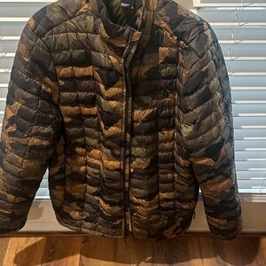 The North Face Men's camo jacket size XL.
